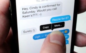 forward text messages - Tap and hold an iMessage to reveal More button