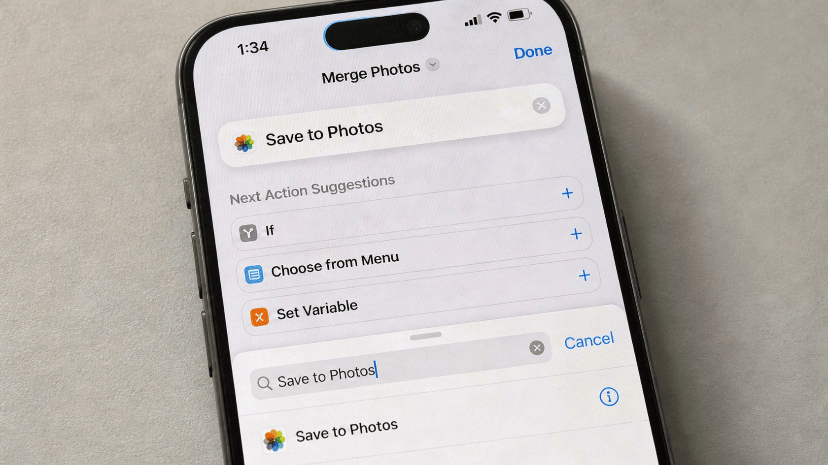 iPhone screen in Shortcuts app adding "Save to Photos" action to shortcut workflow