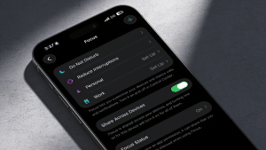iPhone Focus settings with Do Not Disturb, Reduce Interruptions, Personal, Work, Share Across Devices, Focus Status toggle