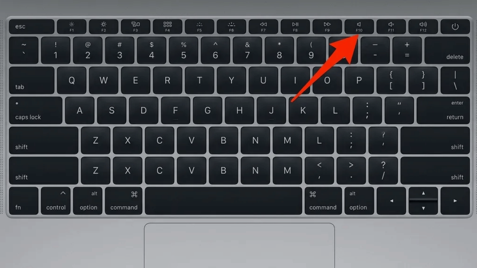 mac-book-keyboard-with-red-arrow-pointing-to-f10-mute-key-in-top-row