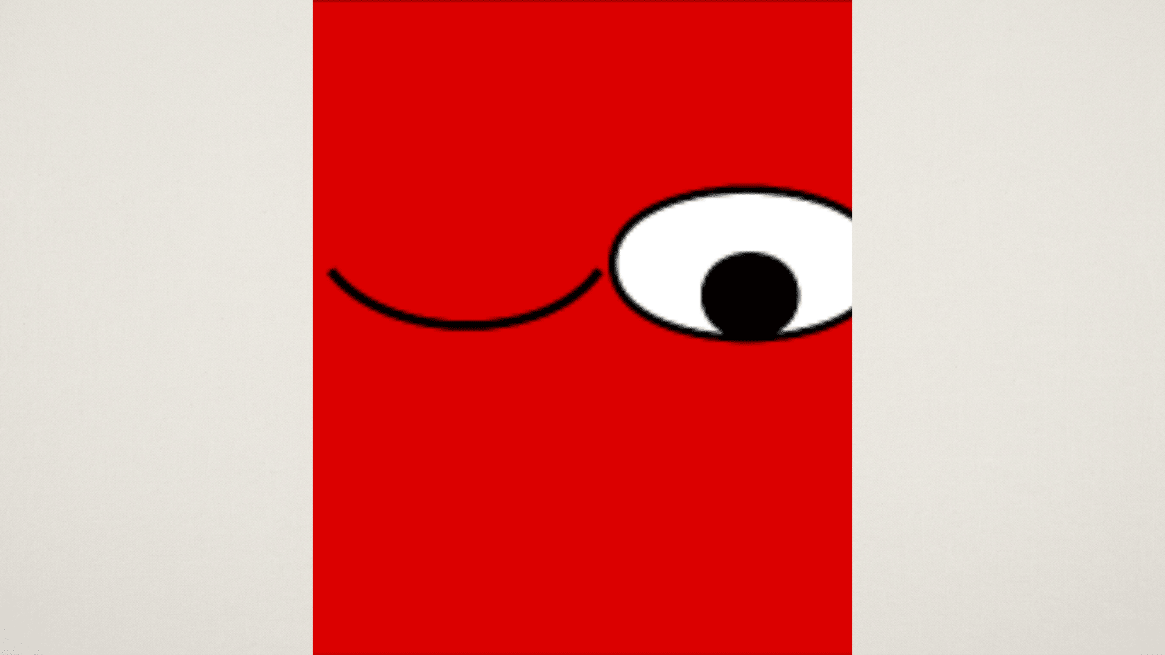 Reveddit logo close-up: a winking cartoon face with one open eye on a red background.