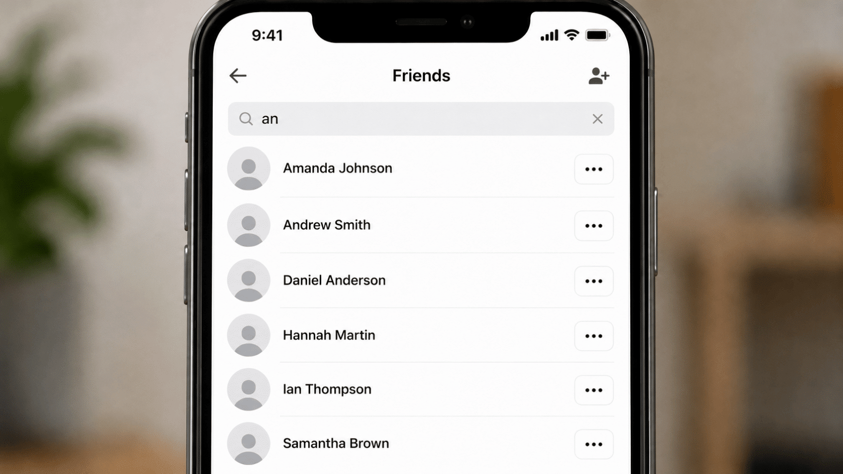 Smartphone showing Friends list screen with search bar containing 'an' and list of contacts names visible
