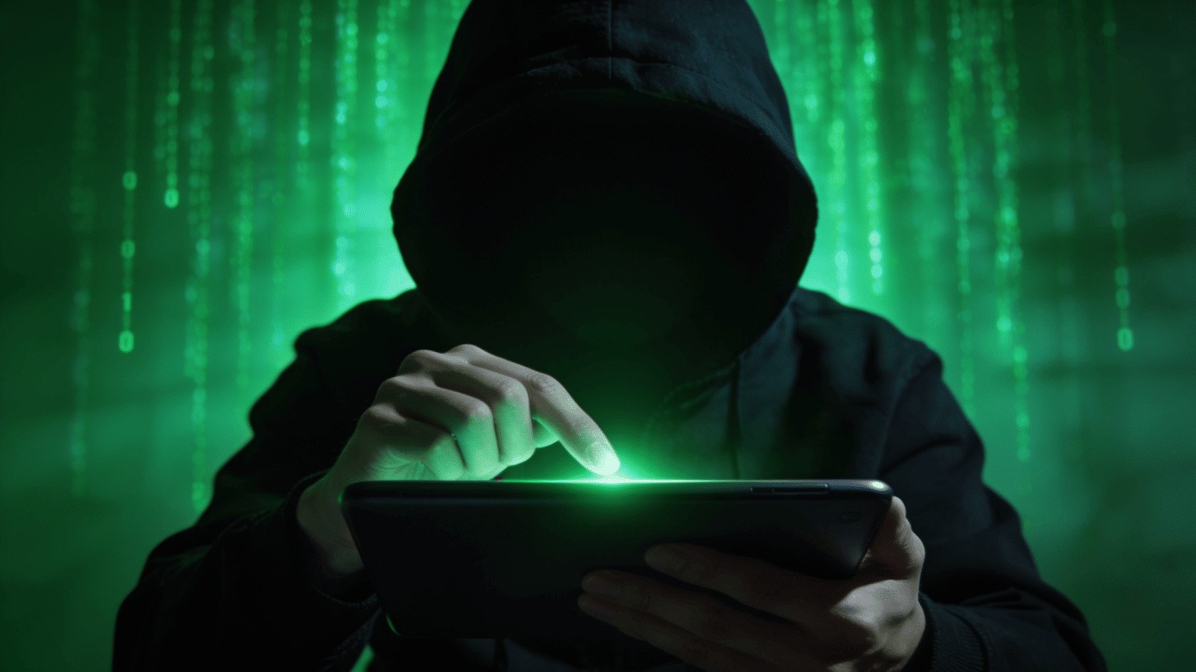 Doxxing concept showing a masked hacker accessing a device with digital data and online privacy threats.