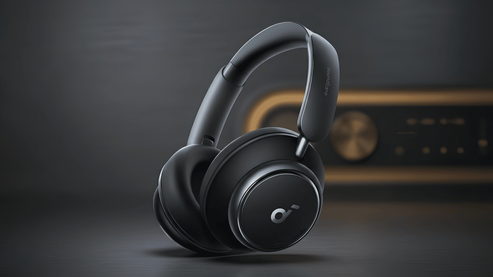 Black Anker Soundcore Space Q45 over-ear headphones displayed on a dark surface.