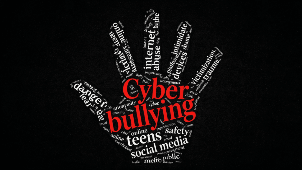 Cyberbullying word cloud with online safety and social media related terms on a black background.