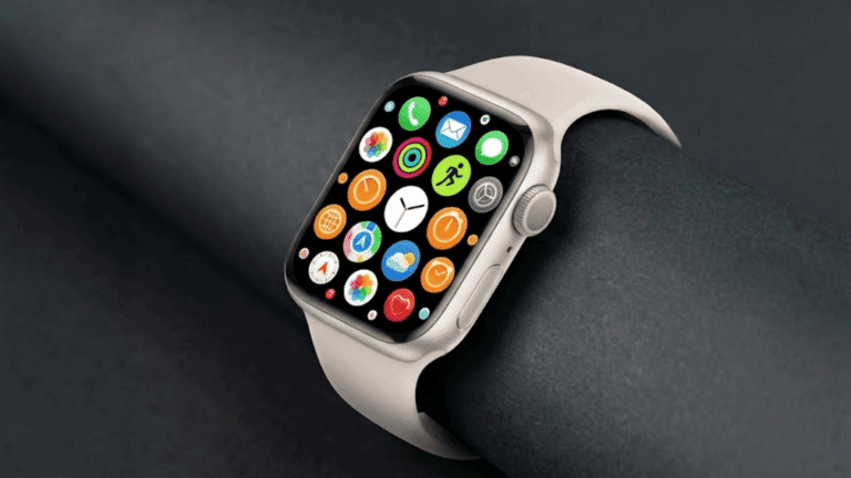 Starlight Apple Watch with matching band on grey background, displaying colorful app grid screen.