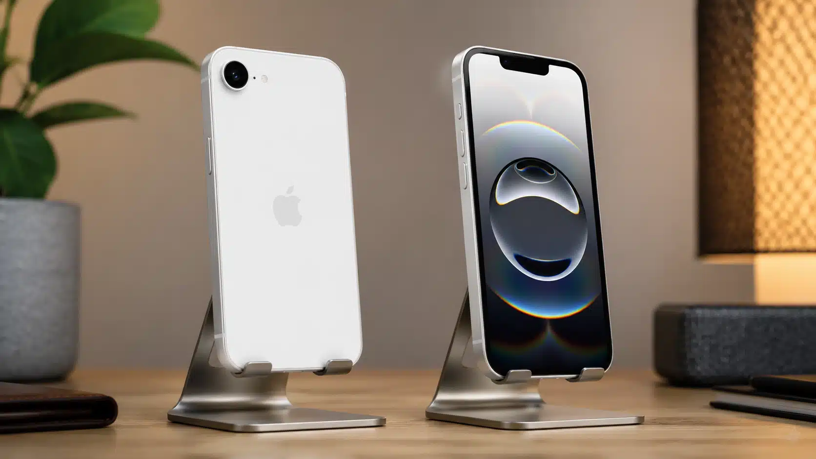 iphone 16e review showing two phones on stands with front and back views on a desk setup