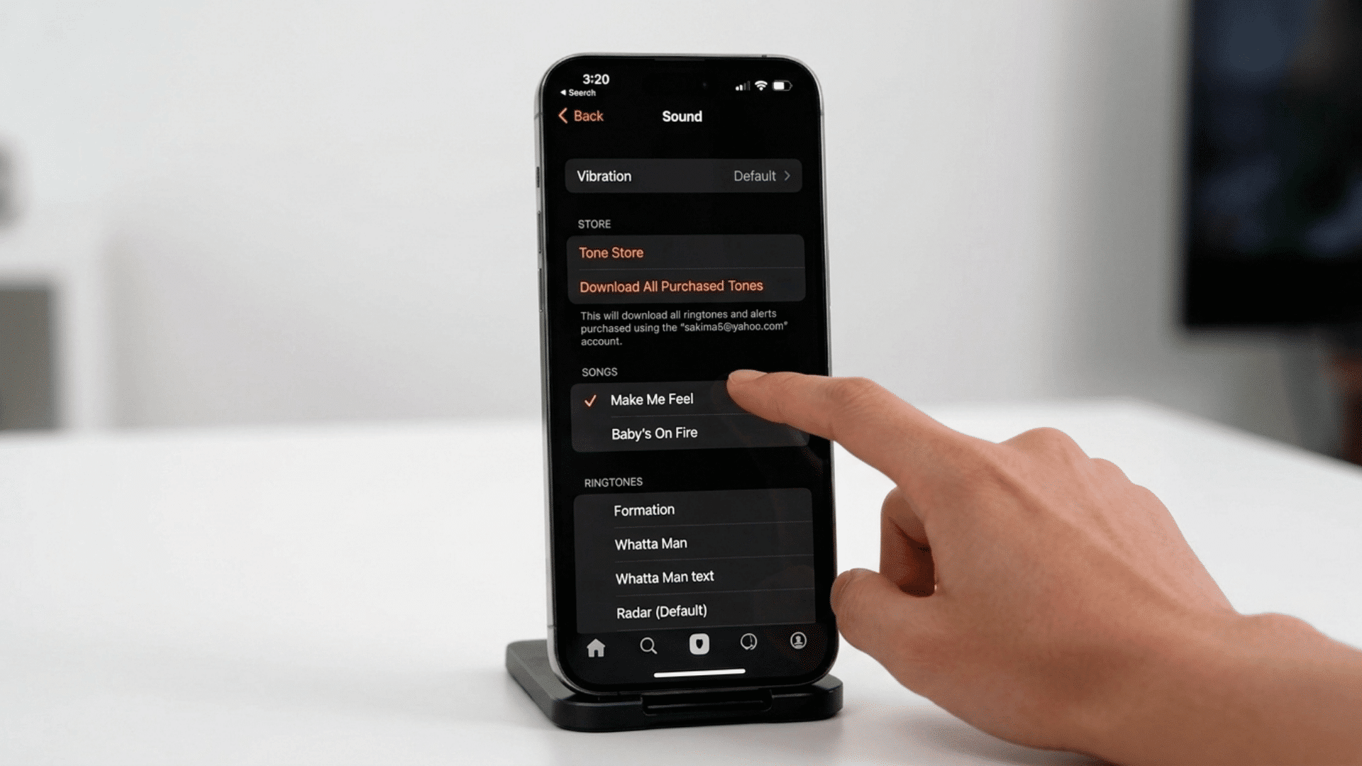 how to change alarm sound on iphone with iPhone Sound screen showing songs and ringtones list