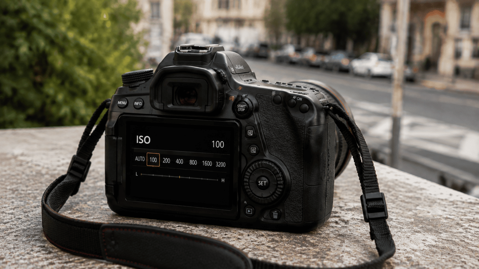 Camera settings screen showing ISO controls and photography adjustments