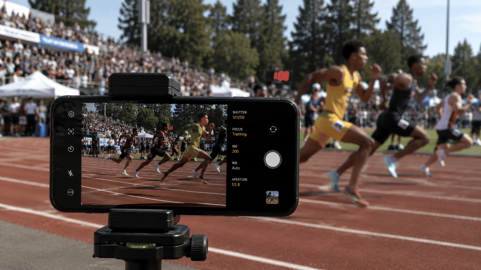 Camera settings for sports photography showing a fast shutter speed and tracking focus while capturing runners.